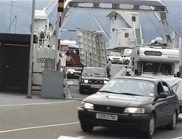 The car ferry unloads at Revsnes, impressing us with its two-level carrying capacity 
